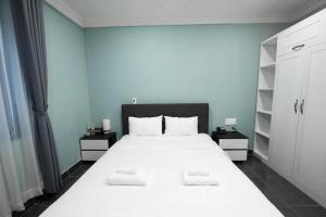 Ліжко або ліжка в номері NEW MILANO HOTEL & APARTMENT