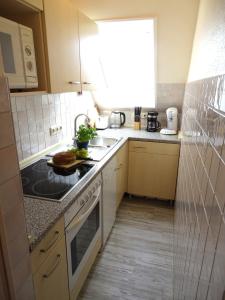 Kuchyň nebo kuchyňský kout v ubytování Ferienhof Specht - Landhaus FeWo 2 + 13 fotografií