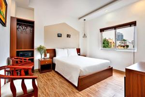 Postel nebo postele na pokoji v ubytování S79 Ami Hotel + 17 fotografií