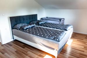 Postelja oz. postelje v sobi nastanitve ARIA DELUXE Mobile Homes with Terme Čatež Tickets