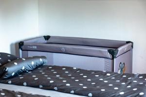 Postel nebo postele na pokoji v ubytování ARIA DELUXE Mobile Homes with Terme Čatež Tickets + 37 fotografií