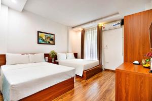 Postel nebo postele na pokoji v ubytování S79 Ami Hotel