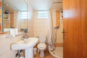 a bathroom with a sink and a toilet and a shower at Ciel Rhodes in Rhodes Town +15 photos