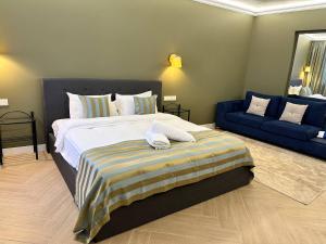 Łóżko lub łóżka w pokoju w obiekcie Miramar Boutique Apartments ADULTS ONLY CORRALEJO