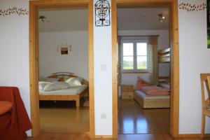 Postel nebo postele na pokoji v ubytování Granerhof Ferien