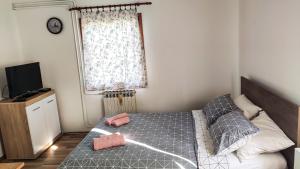 Posteľ alebo postele v izbe v ubytovaní Plitvice Glock Apartment