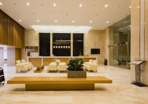 TV a/nebo společenská místnost v ubytování Dendro Gold Hotel