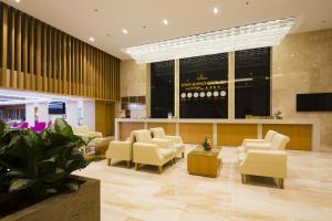 TV a/nebo společenská místnost v ubytování Dendro Gold Hotel