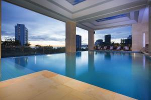 Bazén v ubytování Dendro Gold Hotel nebo v jeho okolí