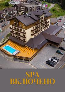 a rendering of a building with a swimming pool at Ganz & SPA in Bukovel