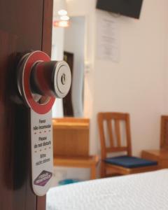 a close up of a door with a knob on a refrigerator at Vegas Residence in Albufeira