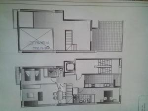 un dibujo de un plano del suelo de una casa en Ático duplex de Maria Jesús, en Buñol