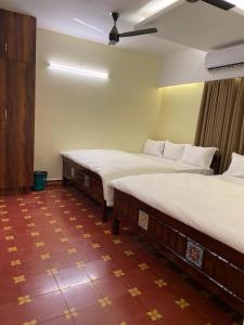 Gulta vai gultas numurā naktsmītnē Viswa Residency Srirangam