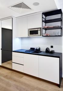 Nhà bếp/bếp nhỏ tại Safari Apartment - Plac Wolności 6