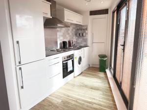 Η κουζίνα ή μικρή κουζίνα στο The Works - Two bed penthouse +9 φωτογραφίες