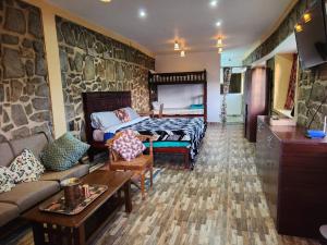 Postel nebo postele na pokoji v ubytování Cloudwalks Homestay