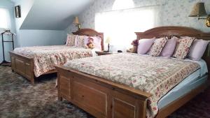 Кровать или кровати в номере Canyon Country Inn