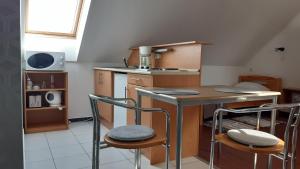 Kuchyňa alebo kuchynka v ubytovaní Mary Apartmanház Hévíz