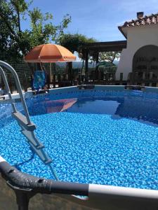 The swimming pool at or close to GuestReady - Nature's Haven Retreat