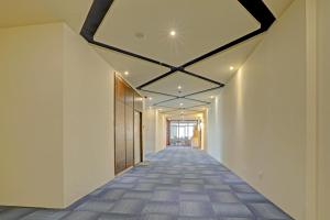 a hallway of a building with a skylight at Townhouse 446 Vista Suites in Turambhe