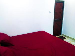 Un ou plusieurs lits dans un hébergement de l'établissement Shree Om Palace Varanasi