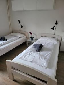 Haus Klaarstrand房間的床