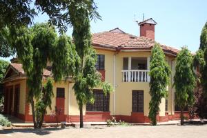 a house with trees in front of it at Wagaview place villa in Nairobi