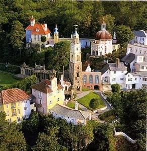 an aerial view of a town with a castle at High View Studio with terrace & sea views in Barmouth