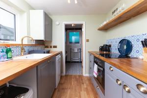 Кухня или мини-кухня в GuestReady - Uma joia escondida em Brighton
