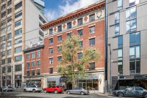 a group of buildings on a city street at Oxford Apartment by At Mine Hospitality in Seattle