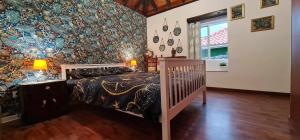Säng eller sängar i ett rum på Casa Monte de Paz