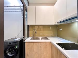 Η κουζίνα ή μικρή κουζίνα στο NINE HOUSING 279 Doi Can