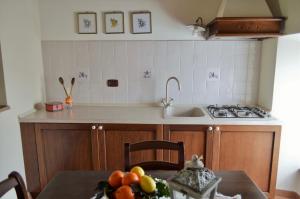 Kuchyň nebo kuchyňský kout v ubytování Agriturismo Il Caggio