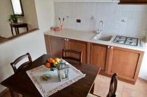 Kuchyň nebo kuchyňský kout v ubytování Agriturismo Il Caggio