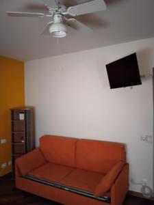 Televiisor ja/või meelelahutuskeskus majutusasutuses Welcome B&B Lodi