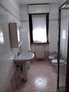 Vannituba majutusasutuses Welcome B&B Lodi