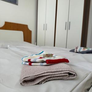 Postel nebo postele na pokoji v ubytování Hotel Avion