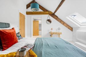 Postel nebo postele na pokoji v ubytování The Shippon, Dawlish