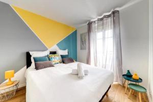 Ένα ή περισσότερα κρεβάτια σε δωμάτιο στο C3 Disney Centre Station