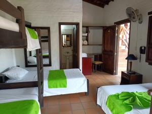 Postel nebo postele na pokoji v ubytování Hotel Verano Resort San Gil + 37 fotografií