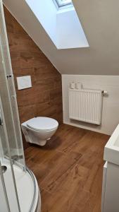 Koupelna v ubytování Apartmány U Provazníka + 12 fotografií