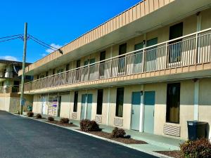 an apartment building with a street in front of it at Travel Inn Bristol near State Street in Bristol