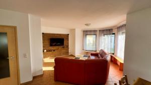 Μια τηλεόραση ή/και κέντρο ψυχαγωγίας στο Ferienhaus Zum Findling