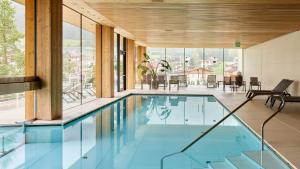 Bazén v ubytování Corona Dolomites Hotel nebo v jeho okolí