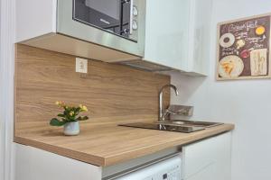 Η κουζίνα ή μικρή κουζίνα στο VIEJO - Calma +10 φωτογραφίες