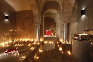 a room with candles and lights in a building at Dar El Marsa Hotel & Spa in La Marsa