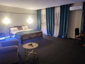 Säng eller sängar i ett rum på Hôtel particulier HP