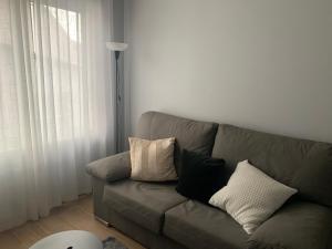 A seating area at Apartamento céntrico a 1km de la playa.