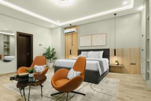 Letto o letti in una camera di Kashco Apartments Wuse 2 Abuja