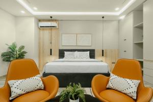 Letto o letti in una camera di Kashco Apartments Wuse 2 Abuja